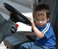 Thai_boy_driving_golf_cart